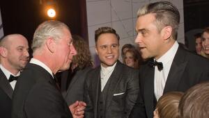 Charles und Robbie Williams bei einer Begegnung im Jahr 2013.