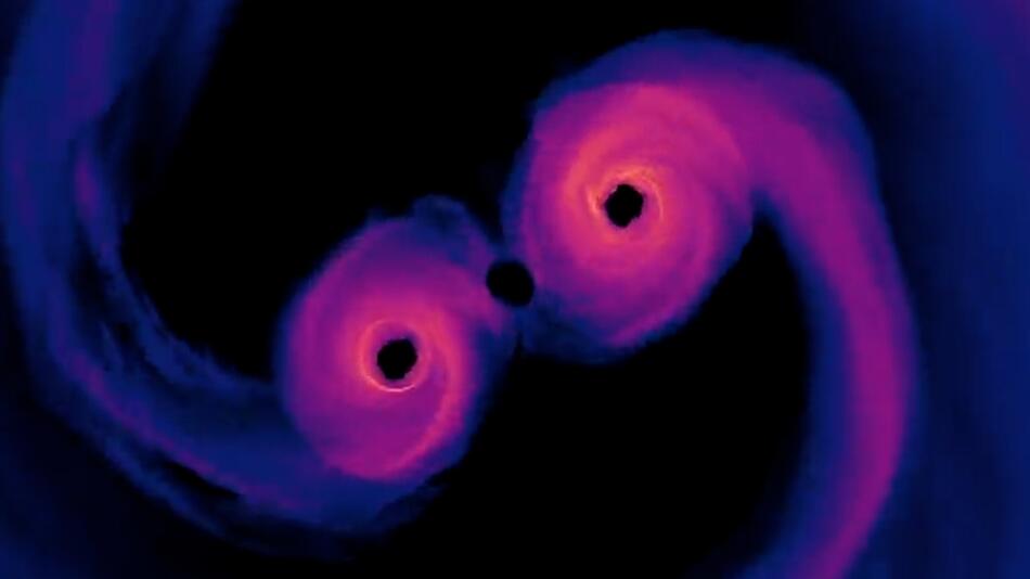 Außerirdisches Spektakel: In drei Jahren könnten zwei supermassereiche Schwarze Löcher kollidieren.