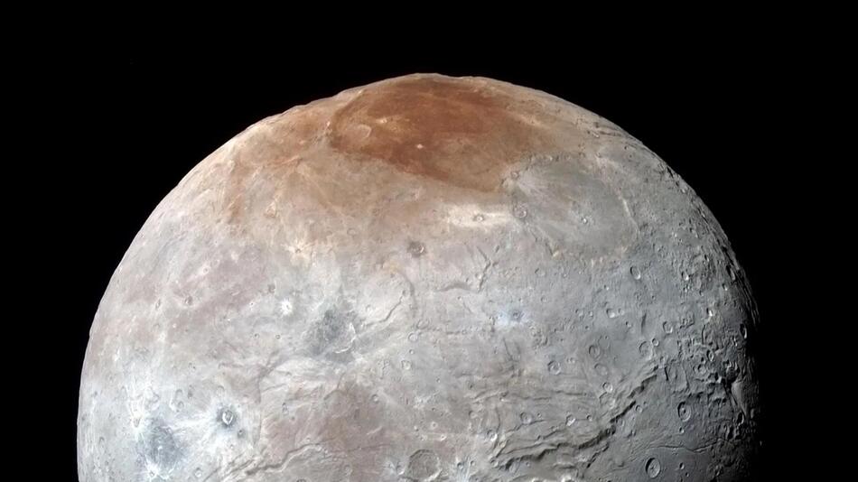 Bleaching agents on Pluto's moon