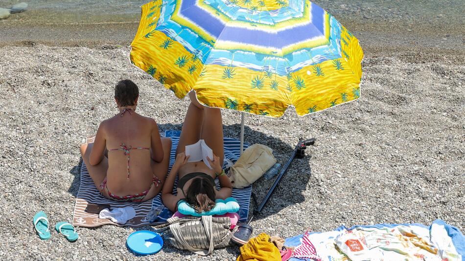 Menschen am Strand