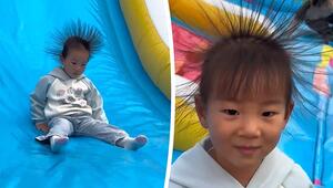 Rutschspaß mit Strom-Effekt: Mädchen sorgt mit Stachel-Frisur für Lacher