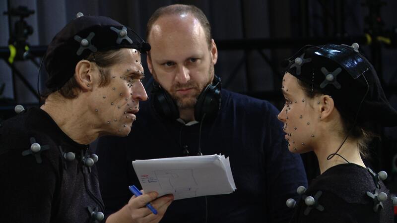 Sensoren im Gesicht: die Schauspieler Willem Dafoe (links) und Ellen Page mit Autor David Cage.