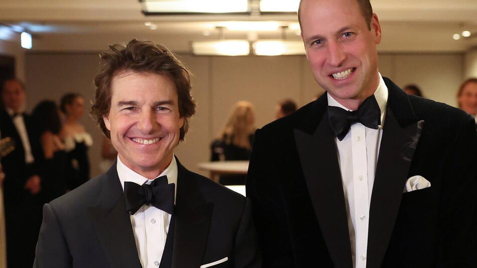 Tom Cruise neben Prinz William bei einem Event in London.