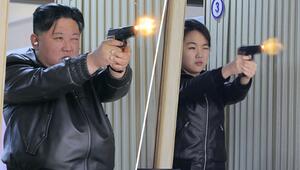 Kim testet Waffen in Munitionsfabrik