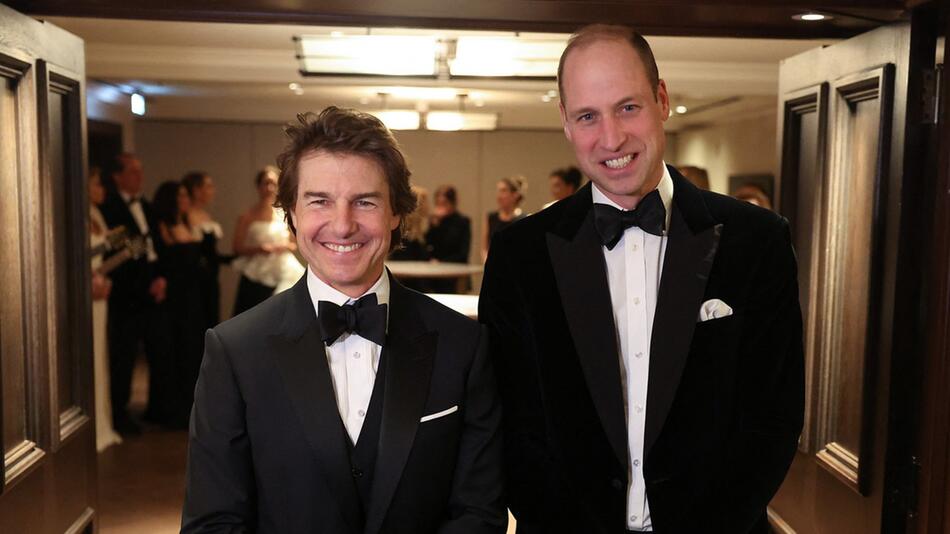 Prinz William (r.) und Tom Cruise bei einem Galadinner der London's Air Ambulance Charity.