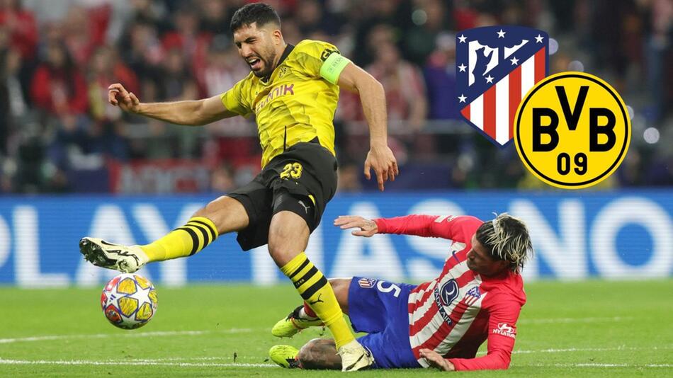Dortmunds Kapitän Emre Can wird gefoult von Atleticos Rodrigo de Paul